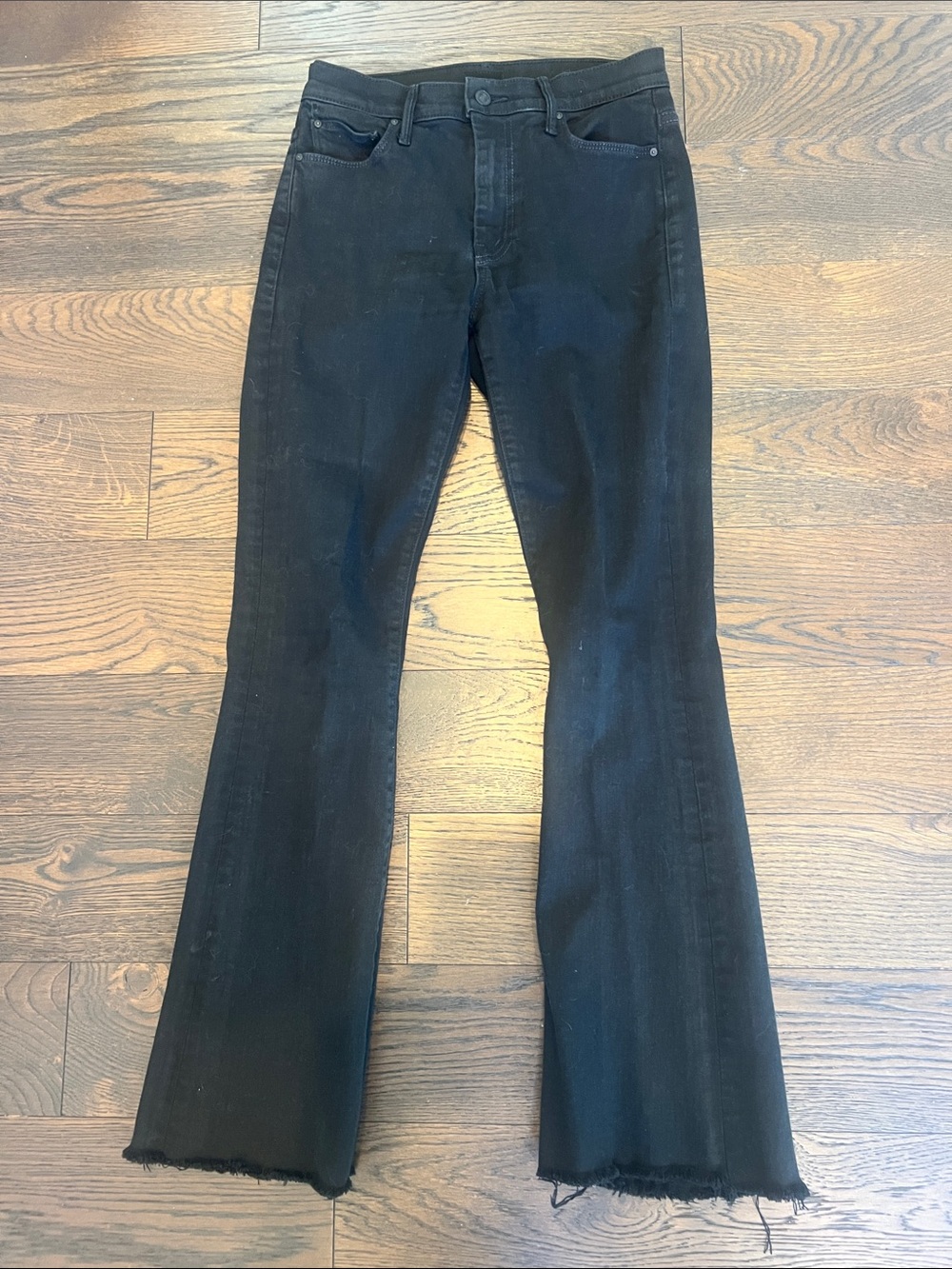 MOTHER Black Flare Weekender Jeans with Raw Hem